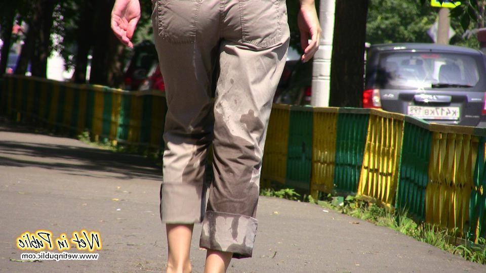 16P Chick wets her pants on the street looking like she forded the river