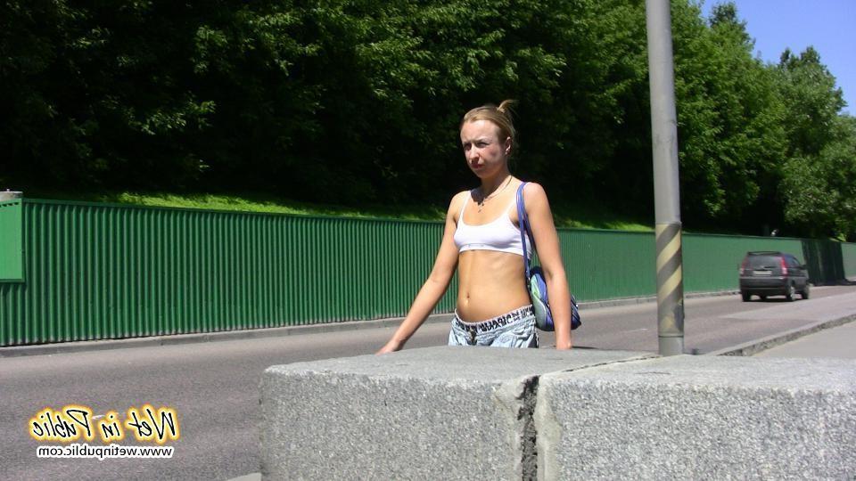 16P Amateur gal in sporty top squats down and pees right through her pants