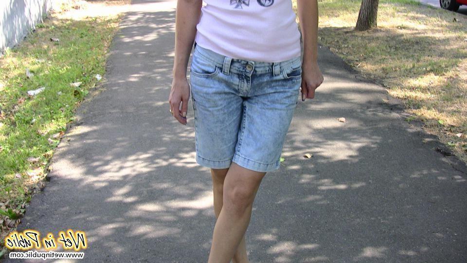 12P Confused girl in the shorts reveals her wet legs and nasty urine spot