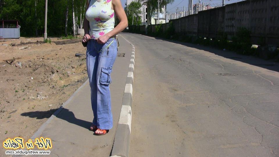 15P Busty bitch pissed herself on the road and then pulled off her jeans