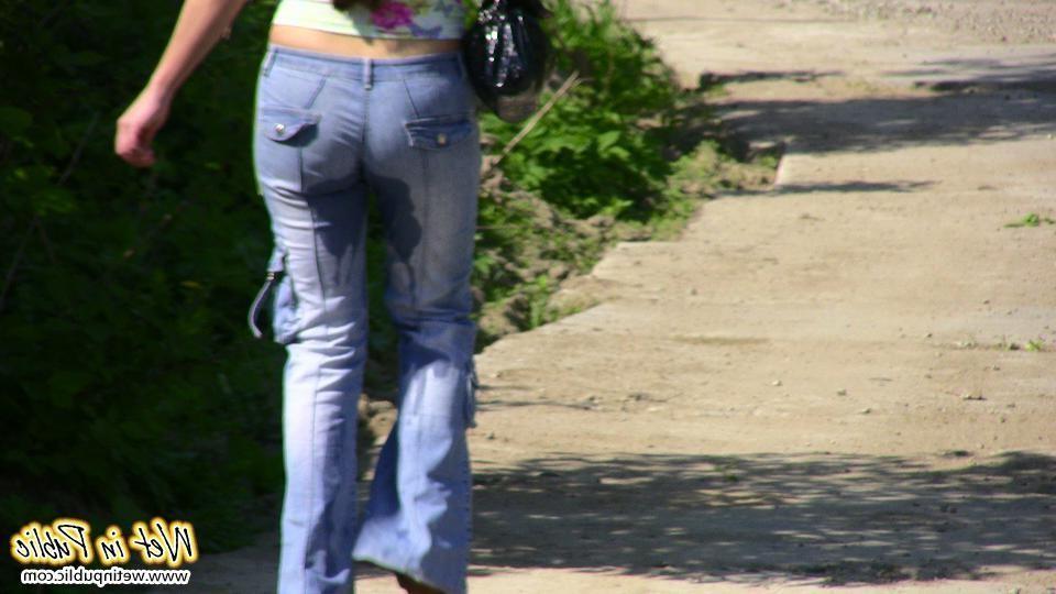 15P Busty bitch pissed herself on the road and then pulled off her jeans
