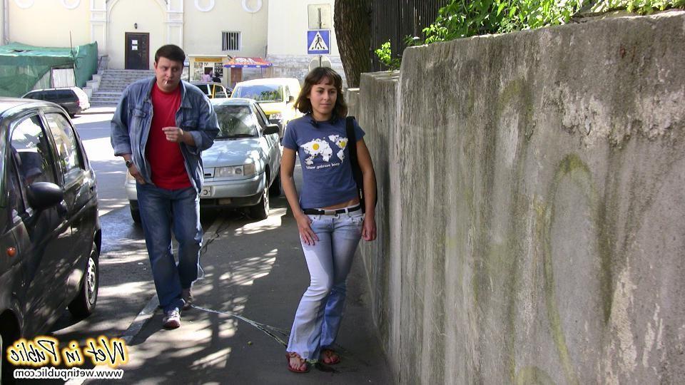 15P Huge ugly piss blotch on the tight jeans of a curvy outdoor bitchie