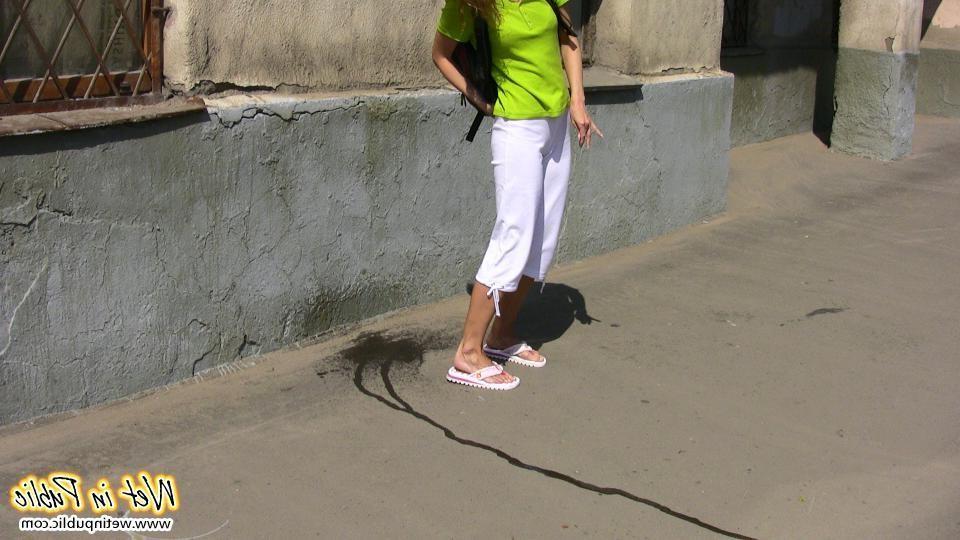15P Humiliated slut who just pissed her white breeches right in the street