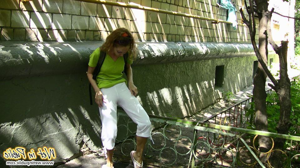 15P Humiliated slut who just pissed her white breeches right in the street
