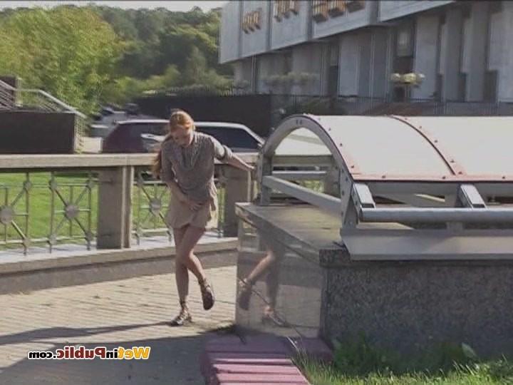 15P Disconcerted cutie splashes her skirt and legs with pee in the street
