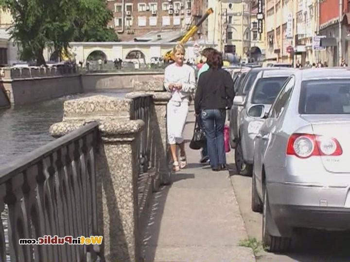 15P Cute blondie soaks her white jeans with piss right in the busy street