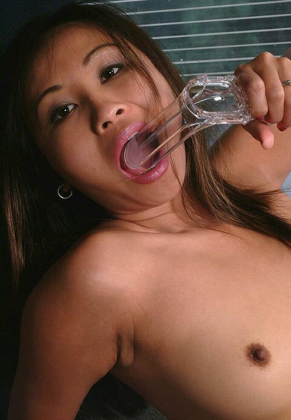 15P Asian bitch stuffing some odd dildo