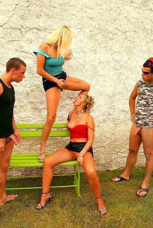 20P Fully clothed group of people pissing in the open air