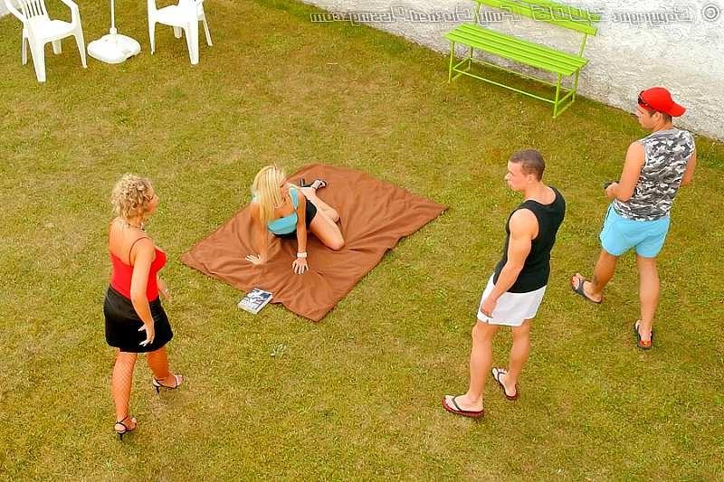 20P Fully clothed group of people pissing in the open air