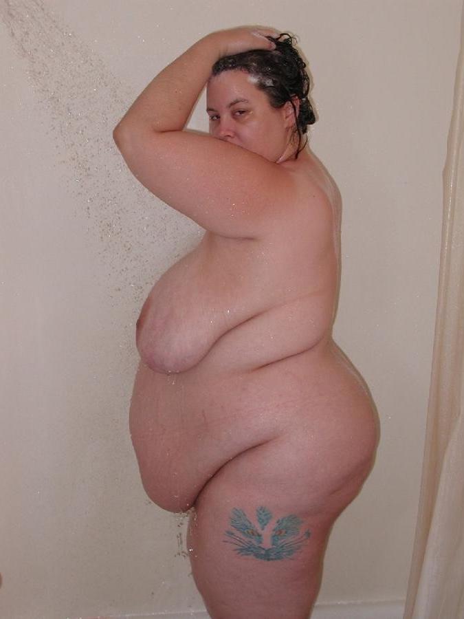 18P Fat granny soaping her huge body