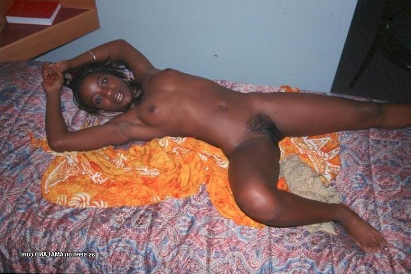 10P Nasty black bitch posing naked in a room
