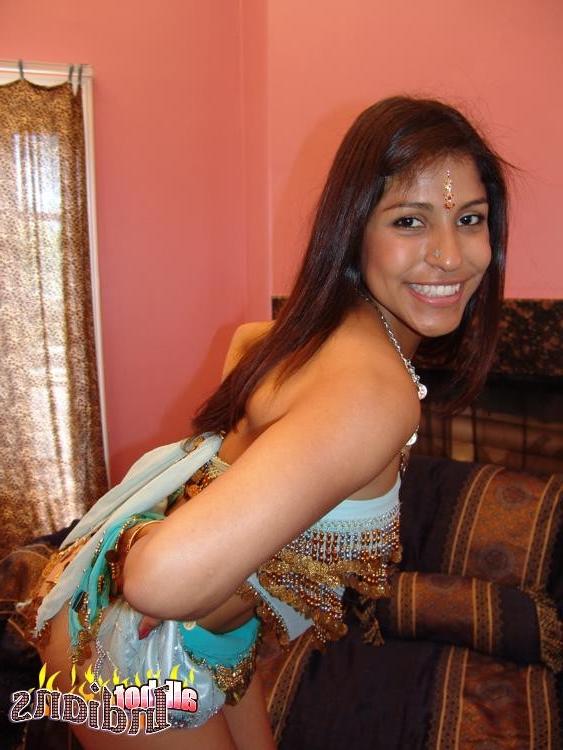 15P Cutie Indian bitch strips lascivious and shows her fuckable booty