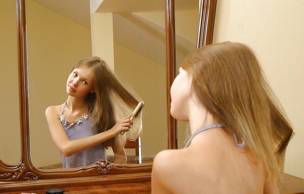 25P Cute russian teen Julia doing make-up