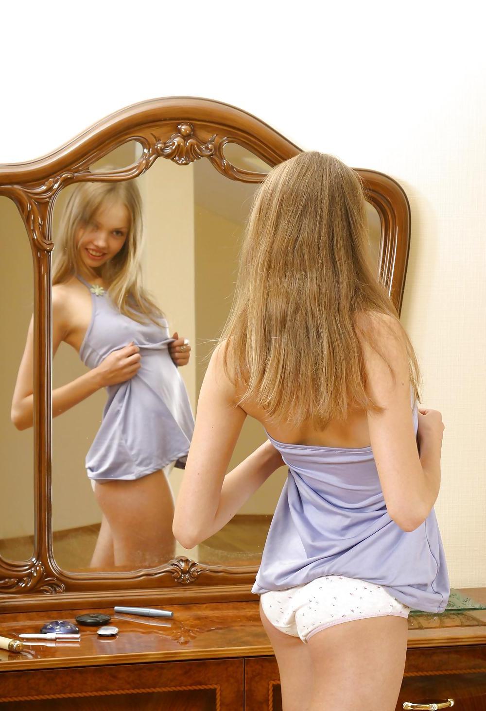 25P Cute russian teen Julia doing make-up