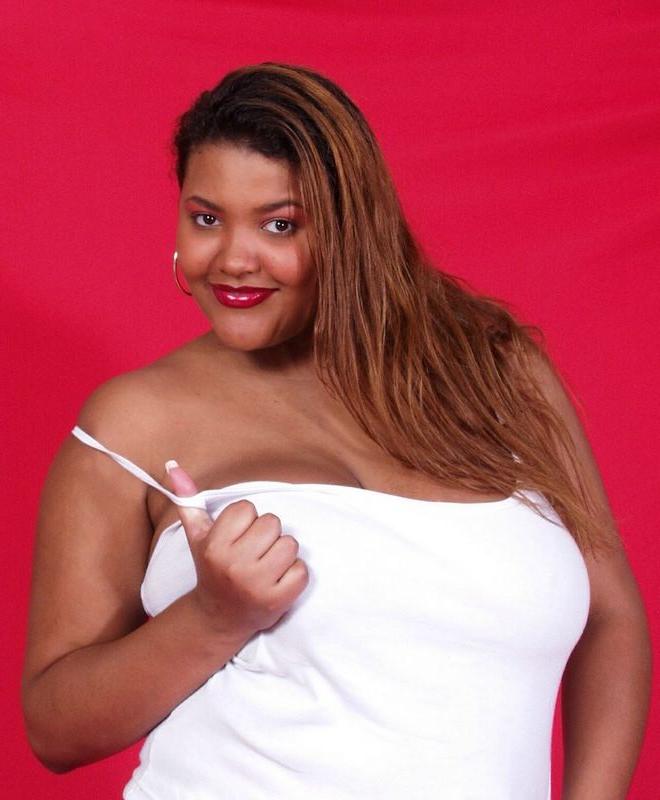 16P Black fat bitch spreading her ass and her pussy