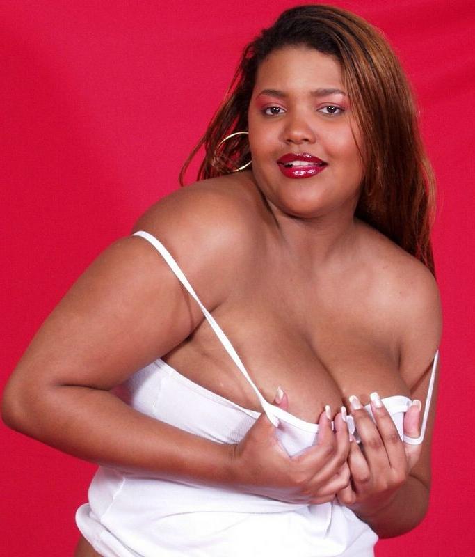 16P Black fat bitch spreading her ass and her pussy