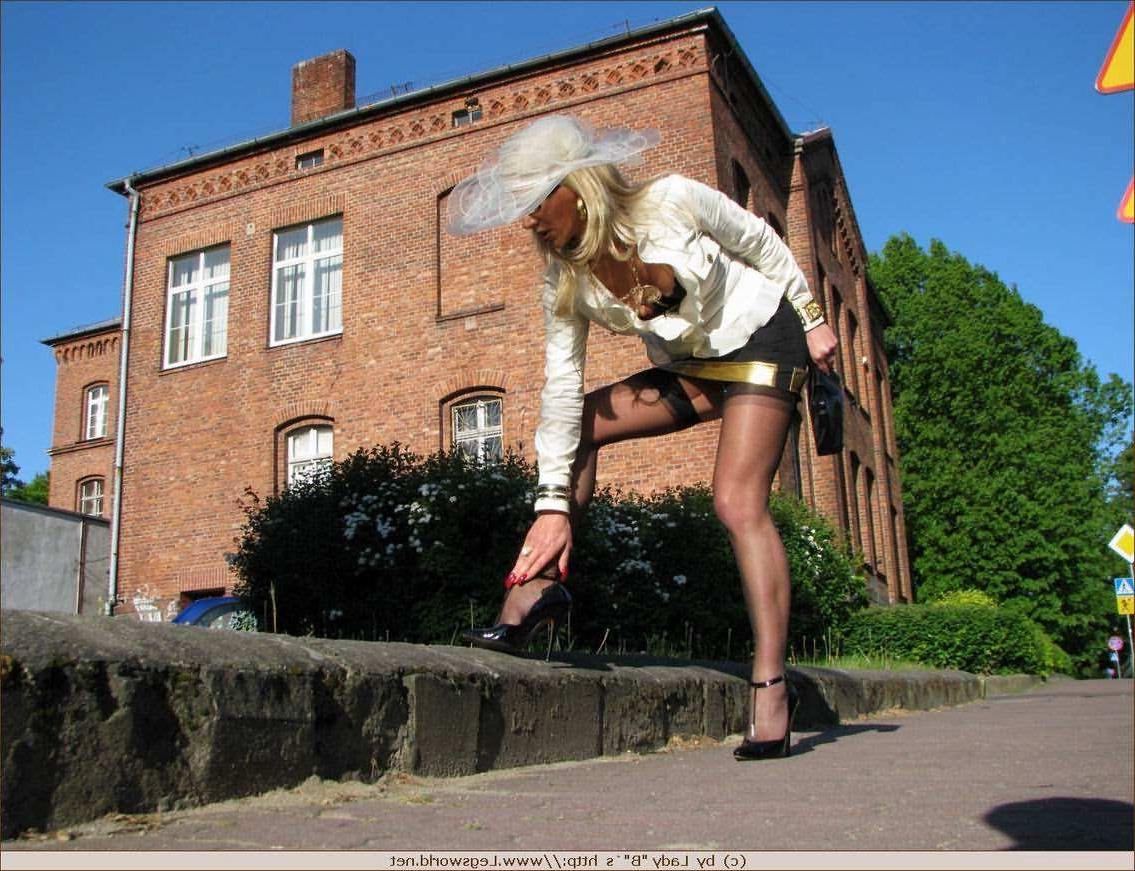 12P Leggy german stocking lady posing in public