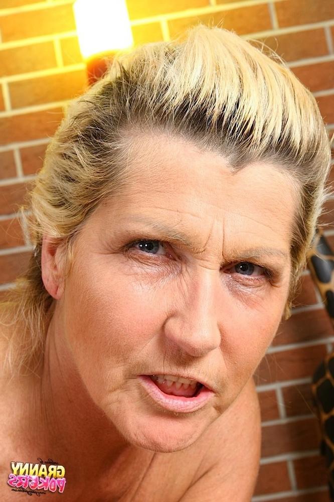 15P Nasty granny spreads her old hairy pussy before getting fucked