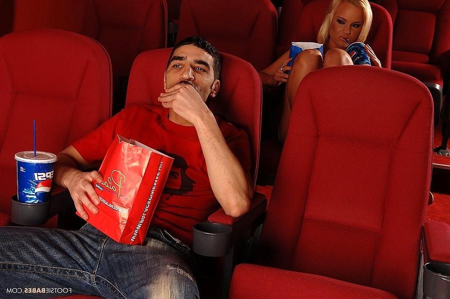 17P lusty blonde beauty does footjob and gets banged in the cinema