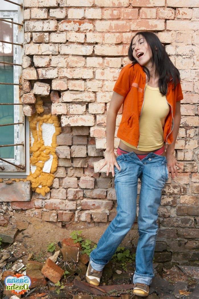 15P Young nasty brunette chick stripping