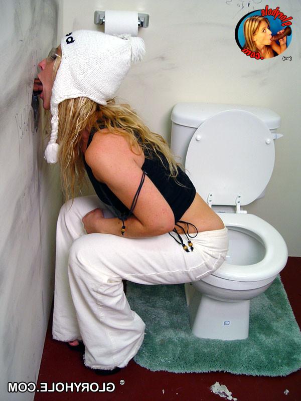 19P Sexy blonde gloryhole slut sucks off black cock in toilet