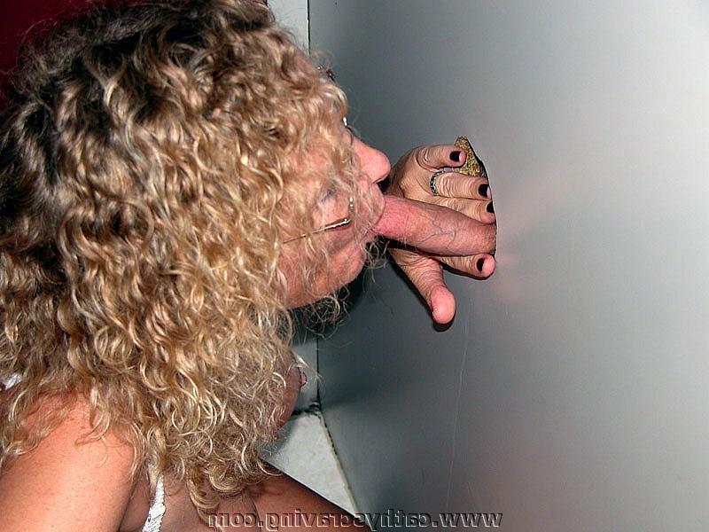 19P Blonde milf blows strangers cocks in gloryhole