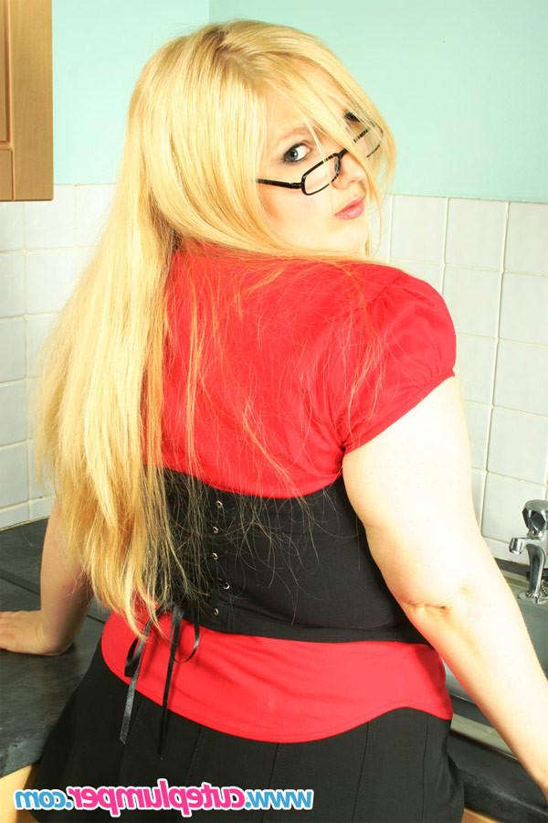 15P Pretty blonde in glasses strips in the office kitchen