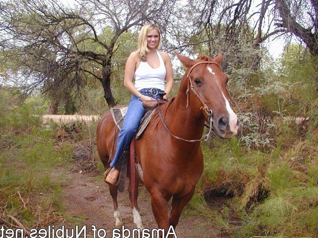 15P Topless blonde on a horse