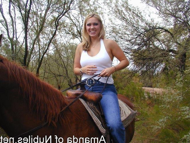15P Topless blonde on a horse