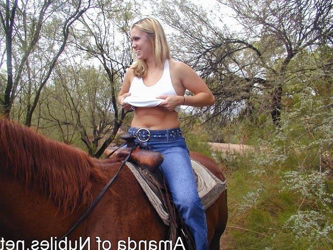 15P Topless blonde on a horse