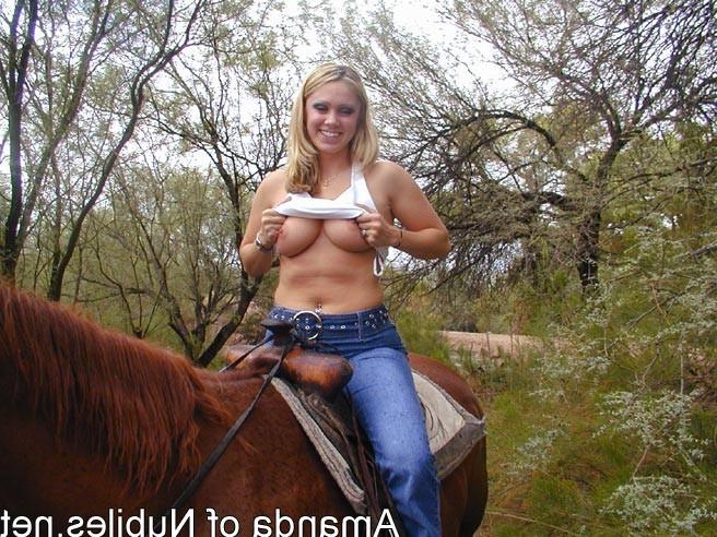 15P Topless blonde on a horse