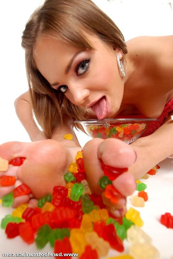 16P Nika Noire Eating Candy With Her Bare Feet