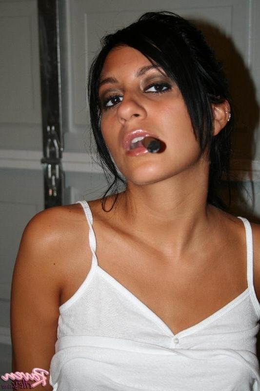 15P Raven Riley enjoys a smoke in the nude