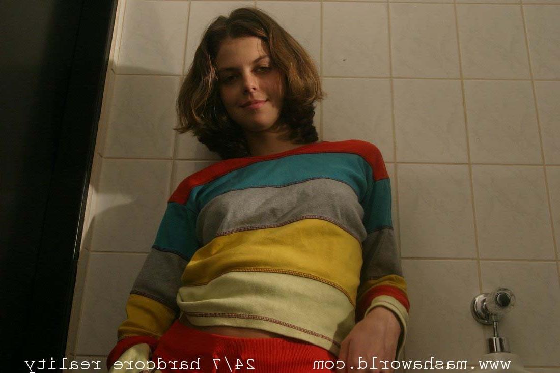 15P Nasty young lady strips in mens toilet