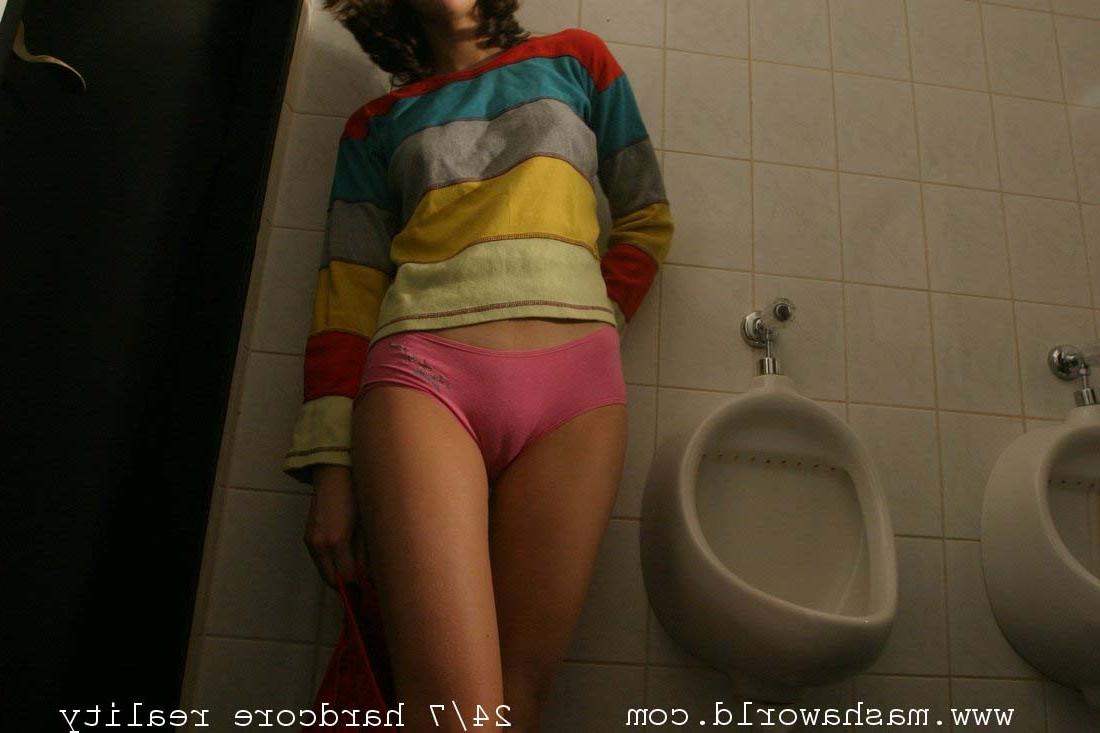 15P Nasty young lady strips in mens toilet