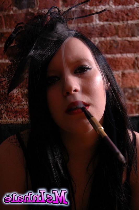 16P goth girl smoking a cigarette