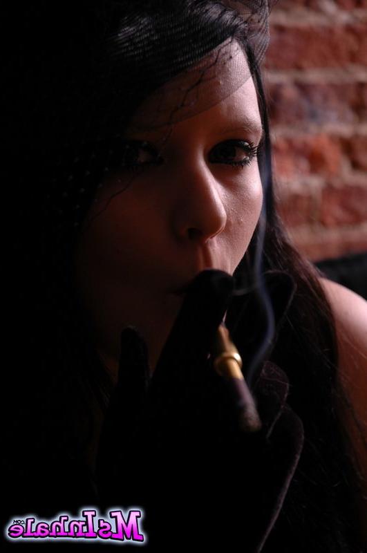 16P goth girl smoking a cigarette