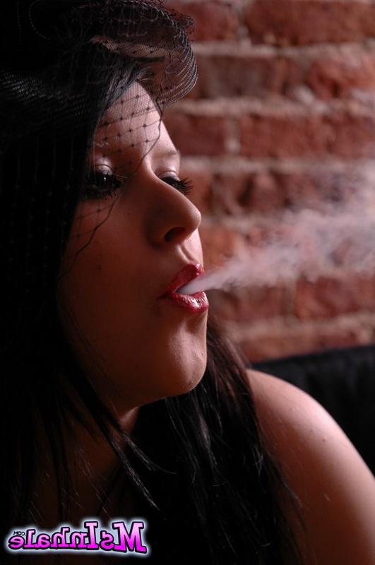 16P goth girl smoking a cigarette