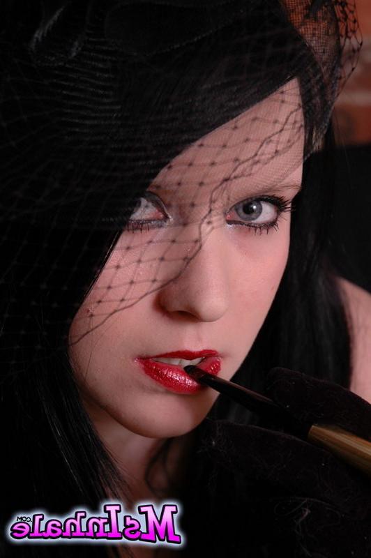 16P goth girl smoking a cigarette
