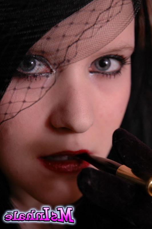 16P goth girl smoking a cigarette