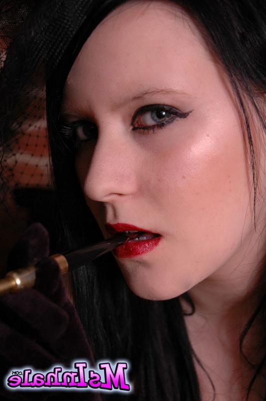 16P goth girl smoking a cigarette