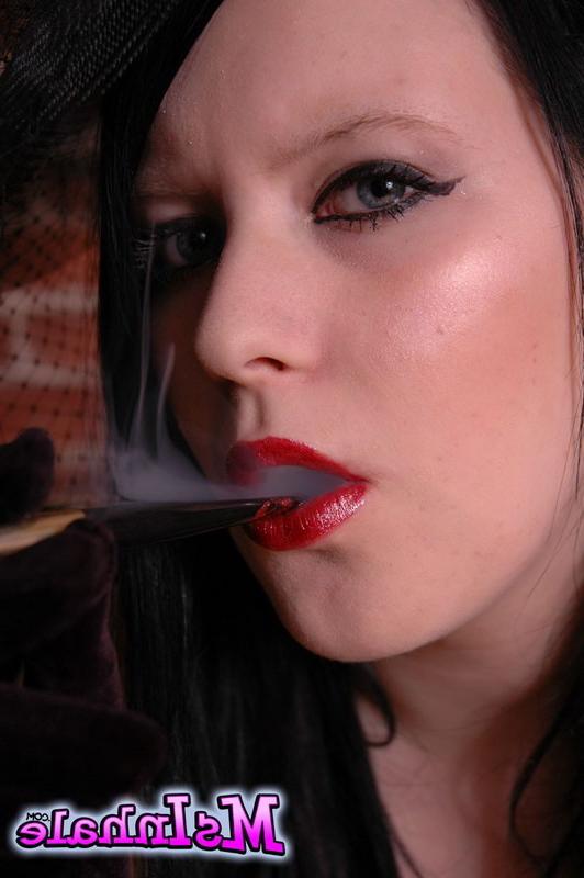 16P goth girl smoking a cigarette