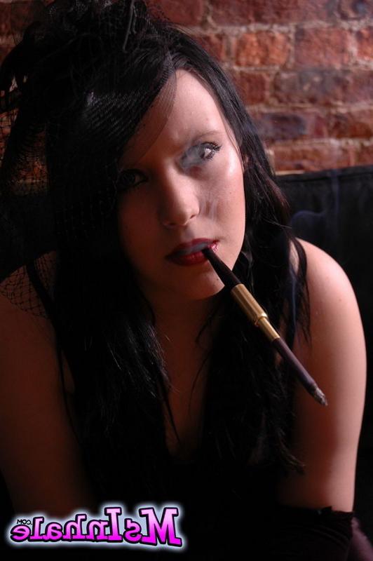 16P goth girl smoking a cigarette