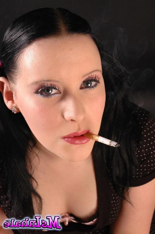 16P brunette teen smoking a cigarette