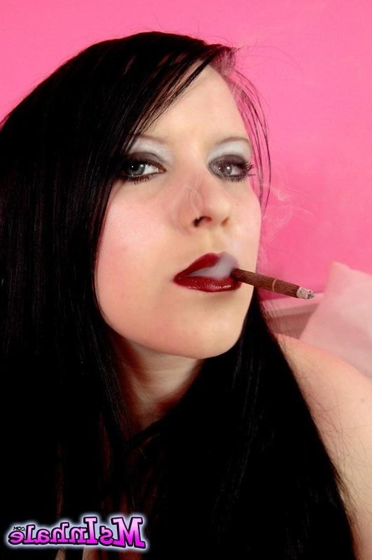 16P goth teen smoking a cigarette