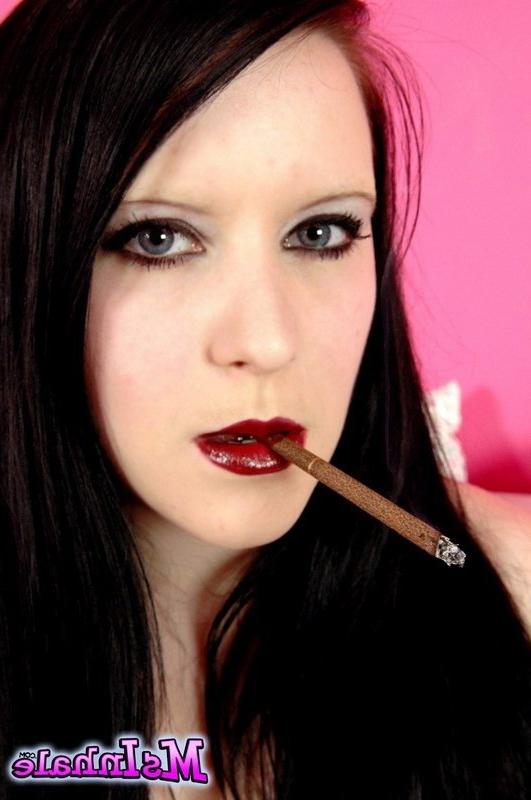 16P goth teen smoking a cigarette