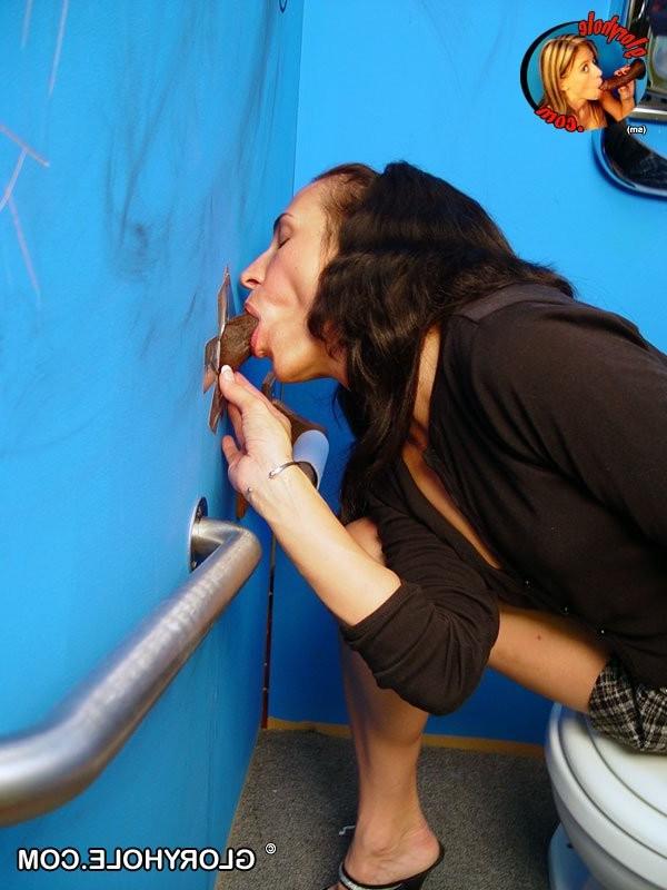 15P Brunette sucks big black dick through a gloryhole