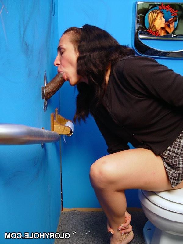 15P Brunette sucks big black dick through a gloryhole