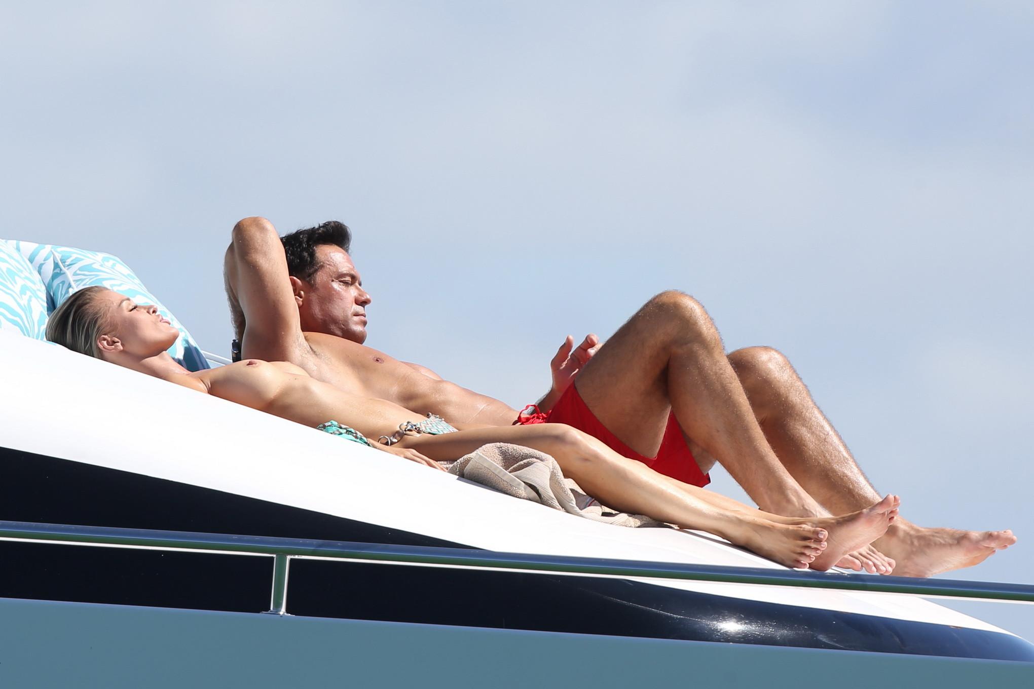 16P Joanna Krupa tanning topless at the yacht in Miami