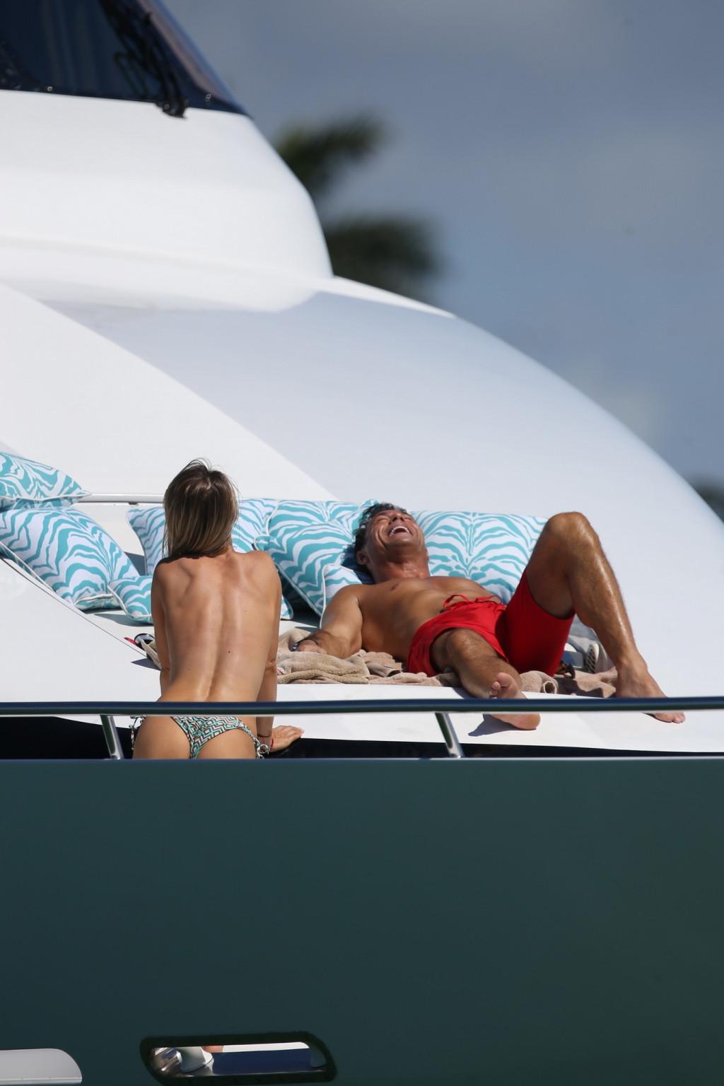 16P Joanna Krupa tanning topless at the yacht in Miami